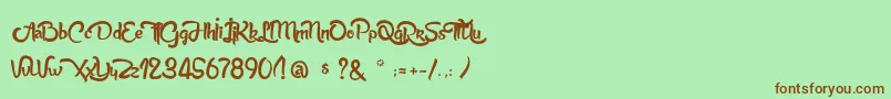 AnabelleScriptLight-Schriftart – Braune Schriften auf grünem Hintergrund