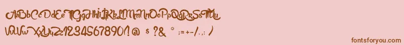 AnabelleScriptLight-Schriftart – Braune Schriften auf rosa Hintergrund