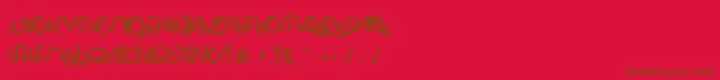 フォントAnabelleScriptLight – 赤い背景に茶色の文字