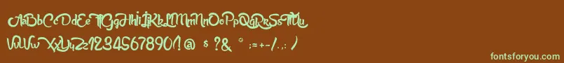 フォントAnabelleScriptLight – 緑色の文字が茶色の背景にあります。