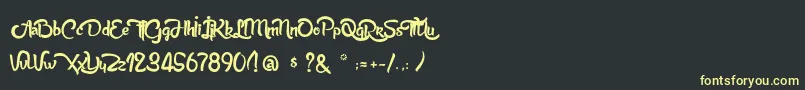 AnabelleScriptLight-fontti – keltaiset fontit mustalla taustalla