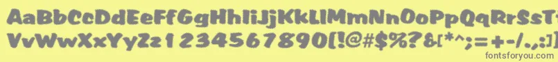 フォントTiffy – 黄色の背景に灰色の文字