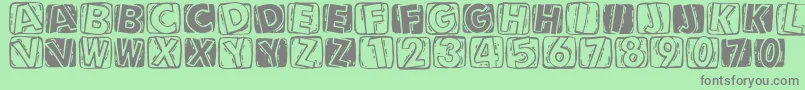 Linocapsa Font – Gray Fonts on Green Background