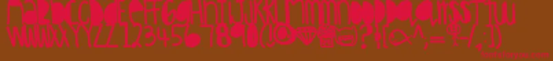 Hakunamatata Font – Red Fonts on Brown Background