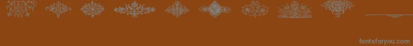 fuente Fraktur – Fuentes Grises Sobre Fondo Marrón