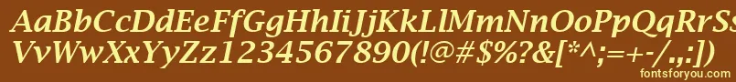 LucidaBrightDemiboldItalic-fontti – keltaiset fontit ruskealla taustalla