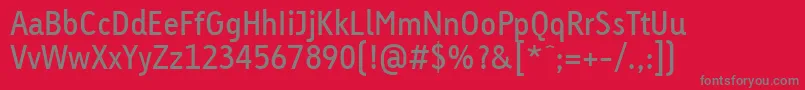 LinotypeTetriaRegularTab-fontti – harmaat kirjasimet punaisella taustalla