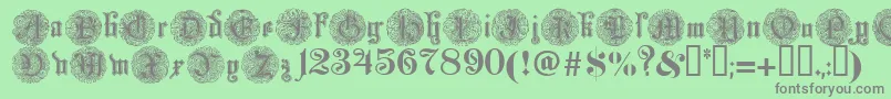 フォントMonarchi – 緑の背景に灰色の文字