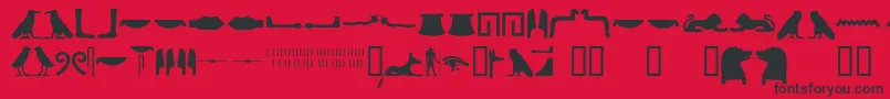 Egyptianhieroglyphssilhouet Font – Black Fonts on Red Background