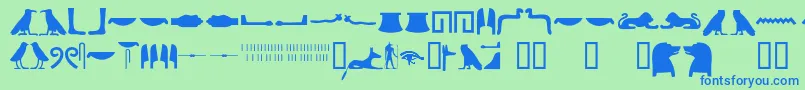 Fonte Egyptianhieroglyphssilhouet – fontes azuis em um fundo verde