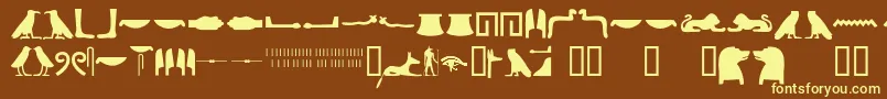 fuente Egyptianhieroglyphssilhouet – Fuentes Amarillas Sobre Fondo Marrón