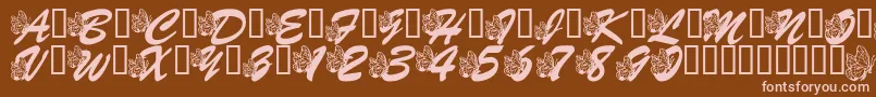 More about LmsHogleZooFlutterbys Font LmsHogleZooFlutterbys Font – Pink Fonts on Brown Background