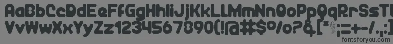 Unocide-Schriftart – Schwarze Schriften auf grauem Hintergrund