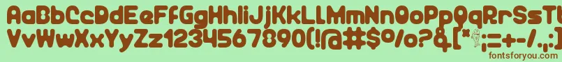 Unocide Font – Brown Fonts on Green Background