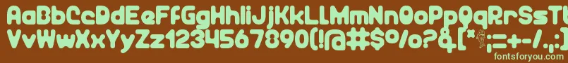 Unocide Font – Green Fonts on Brown Background