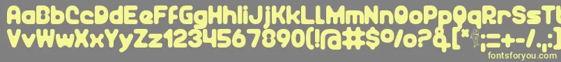 Unocide Font – Yellow Fonts on Gray Background