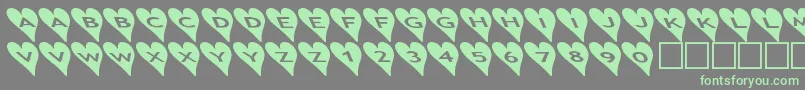 Fonte Ashearts2b – fontes verdes em um fundo cinza