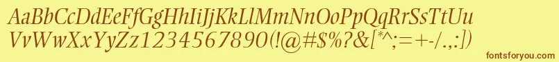 フォントEllingtonmtstdLightitalic – 茶色の文字が黄色の背景にあります。