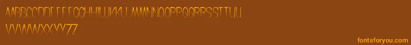 CrochetPattern Font – Orange Fonts on Brown Background