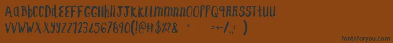 F...SaintTropezAlt Font – Black Fonts on Brown Background
