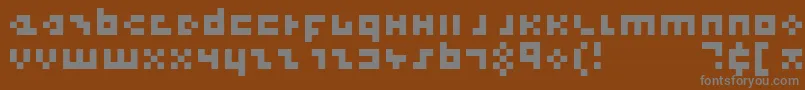 CoolThreePixels Font – Gray Fonts on Brown Background