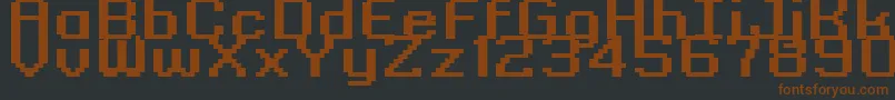 Więcej informacji o czcionce GrixelKyrou9RegularBoldXtnd Czcionka GrixelKyrou9RegularBoldXtnd – brązowe czcionki na czarnym tle