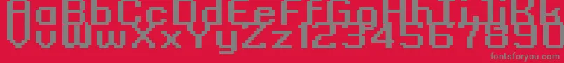 フォントGrixelKyrou9RegularBoldXtnd – 赤い背景に灰色の文字