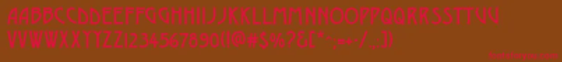 GeDelphinaeusCaps Font – Red Fonts on Brown Background