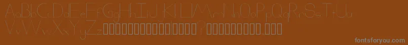 フォントXack – 茶色の背景に灰色の文字