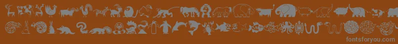 MiniPicsLilCritters-Schriftart – Graue Schriften auf braunem Hintergrund