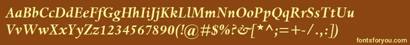 DanteMtBoldItalic-fontti – keltaiset fontit ruskealla taustalla
