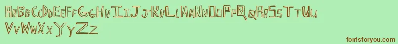 HappyCaps Font – Brown Fonts on Green Background