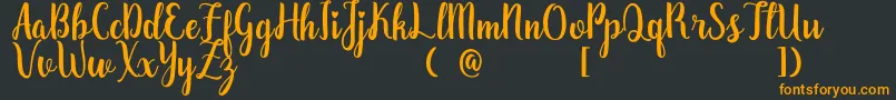 ZaheeraDemo Font – Orange Fonts on Black Background