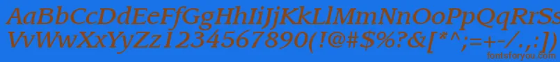 Czcionka ItcLeawoodLtMediumItalic – brązowe czcionki na niebieskim tle