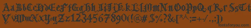 Bitmgothic Font – Black Fonts on Brown Background