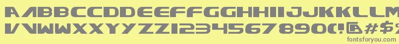 Xcelv3-fontti – harmaat kirjasimet keltaisella taustalla