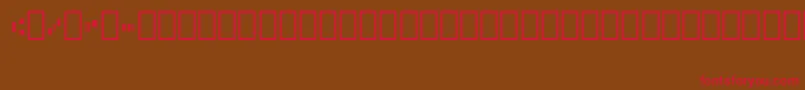 フォントMicr012Bt – 赤い文字が茶色の背景にあります。