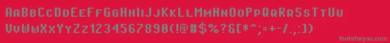 PixeloperatorscBold-fontti – harmaat kirjasimet punaisella taustalla