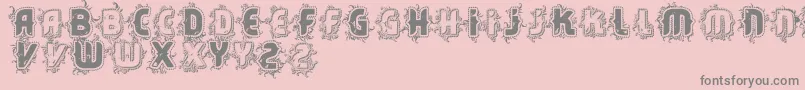 Vtkscore-Schriftart – Graue Schriften auf rosa Hintergrund