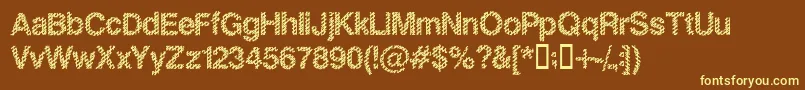 Slankb-fontti – keltaiset fontit ruskealla taustalla