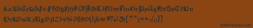 MousefrakturBold-fontti – mustat fontit ruskealla taustalla