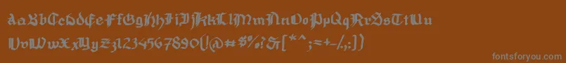 フォントMousefrakturBold – 茶色の背景に灰色の文字