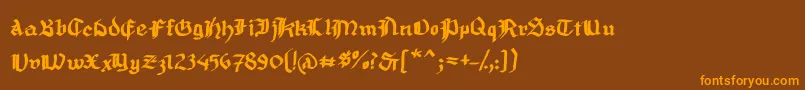 フォントMousefrakturBold – オレンジ色の文字が茶色の背景にあります。