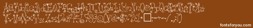 DanzinRegular-Schriftart – Weiße Schriften auf braunem Hintergrund