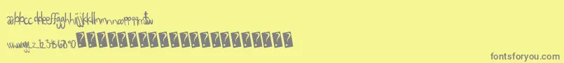 Eigthgrade-fontti – harmaat kirjasimet keltaisella taustalla