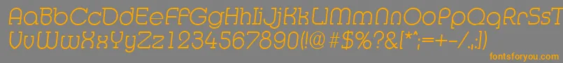 Czcionka MexicoserialXlightItalic – pomarańczowe czcionki na szarym tle