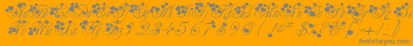 McSweetieHearts-Schriftart – Graue Schriften auf orangefarbenem Hintergrund