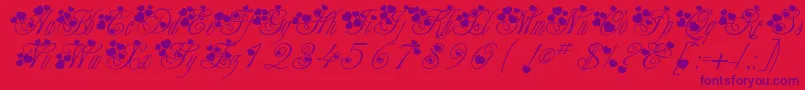 McSweetieHearts-Schriftart – Violette Schriften auf rotem Hintergrund