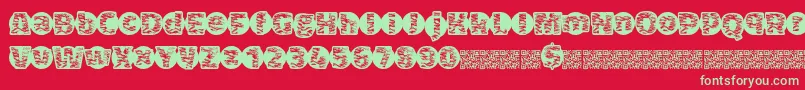 フォントTigerbawl – 赤い背景に緑の文字