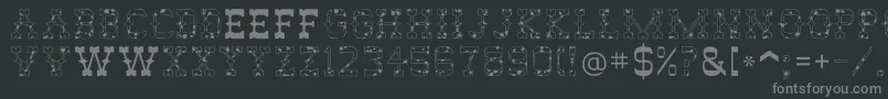 AbileneCow-fontti – harmaat kirjasimet mustalla taustalla
